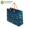 Bolsa de lujo 41x12x32cm con asa de cordón resistente.