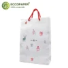 Bolsa de papel premium 24x10x35cm con diseño atractivo y resistente.